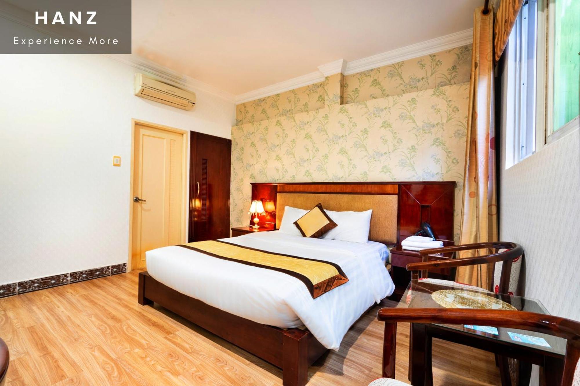 Cosmo Central Hotel โฮจิมินห์ซิตี้ ห้อง รูปภาพ