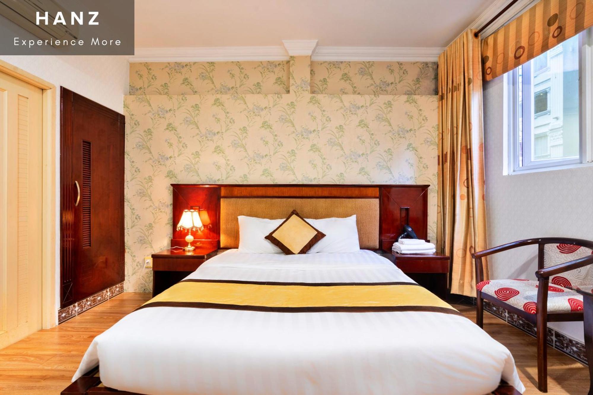 Cosmo Central Hotel โฮจิมินห์ซิตี้ ห้อง รูปภาพ